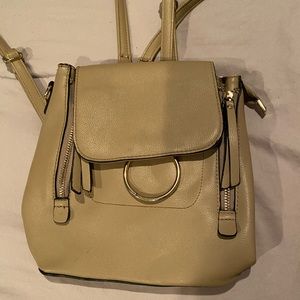 Beige back pack purse
